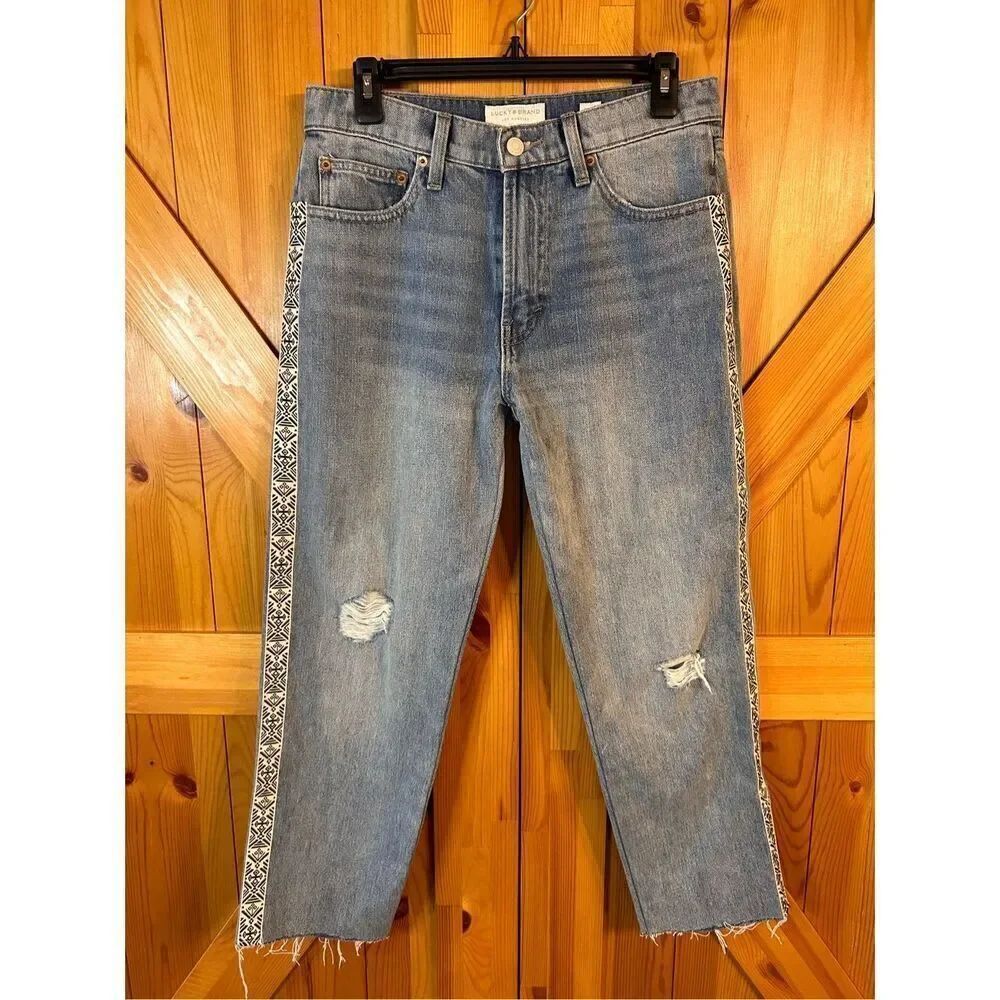 Lucky brand relaxed taper jeans Size 4/27 raw hem  side design (4668)